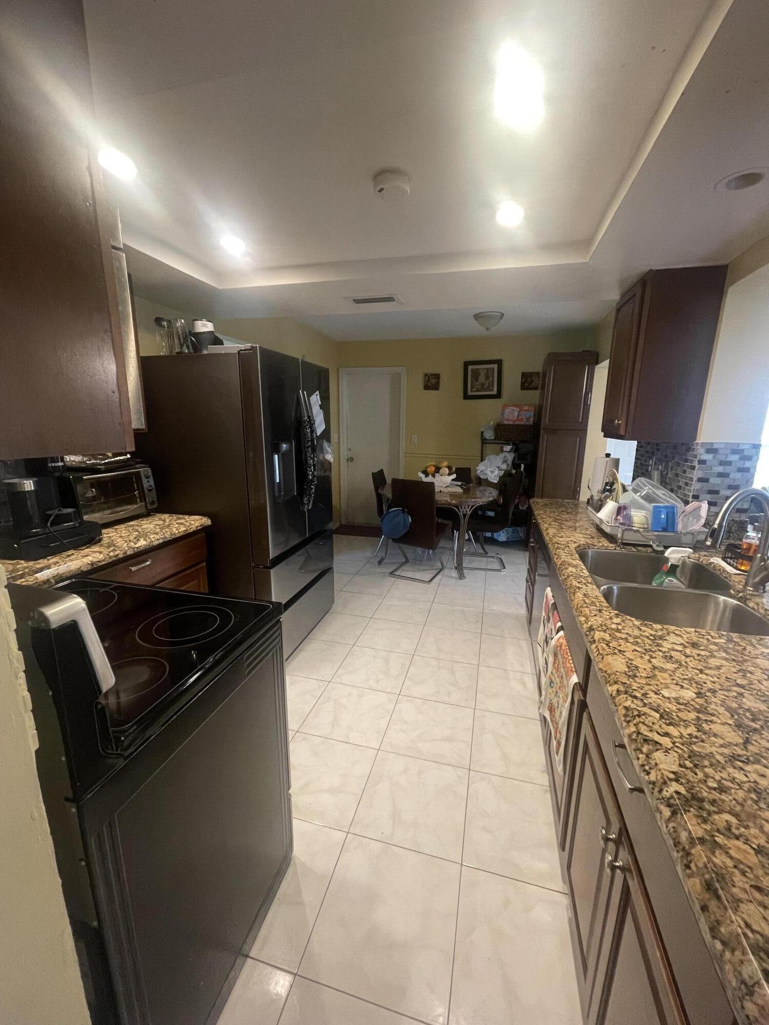 5706 Northwest 68th Terrace Tamarac, FL 33321 - Photo 2 of 30 IMG_7844