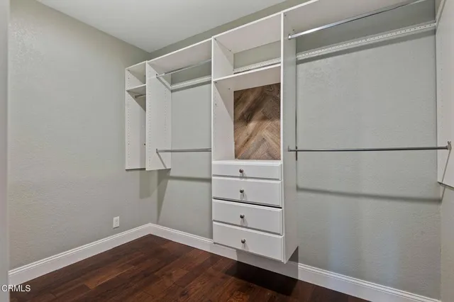 a view of an empty walk in closet