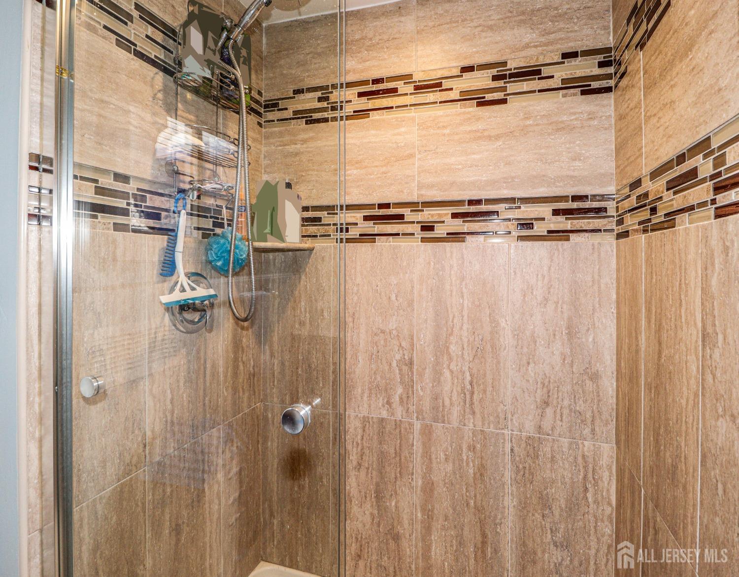 38 Westminster Road Colonia, NJ 07067 - Photo 16 of 24 a close view of a shower in bathroom