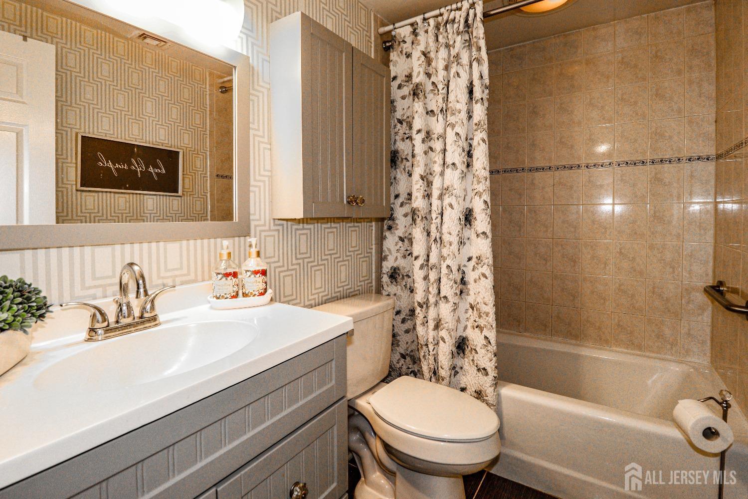 38 Westminster Road Colonia, NJ 07067 - Photo 21 of 24 a bathroom with a sink toilet and shower