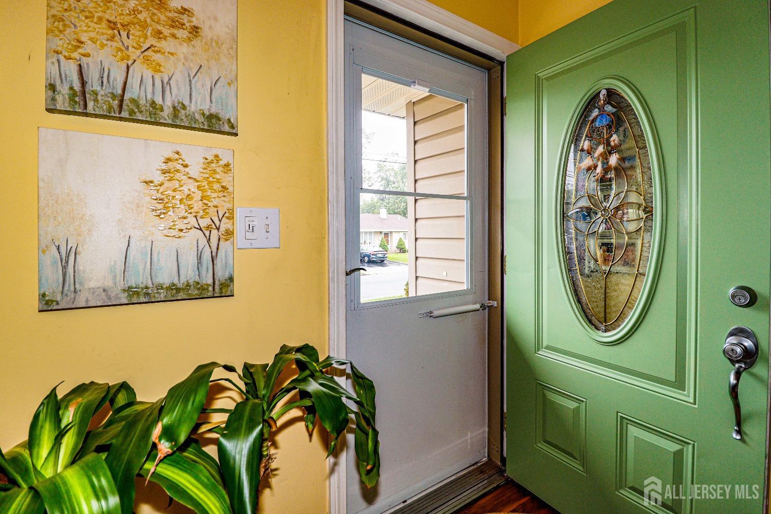 38 Westminster Road Colonia, NJ 07067 - Photo 4 of 24 a view of a door with a mirror