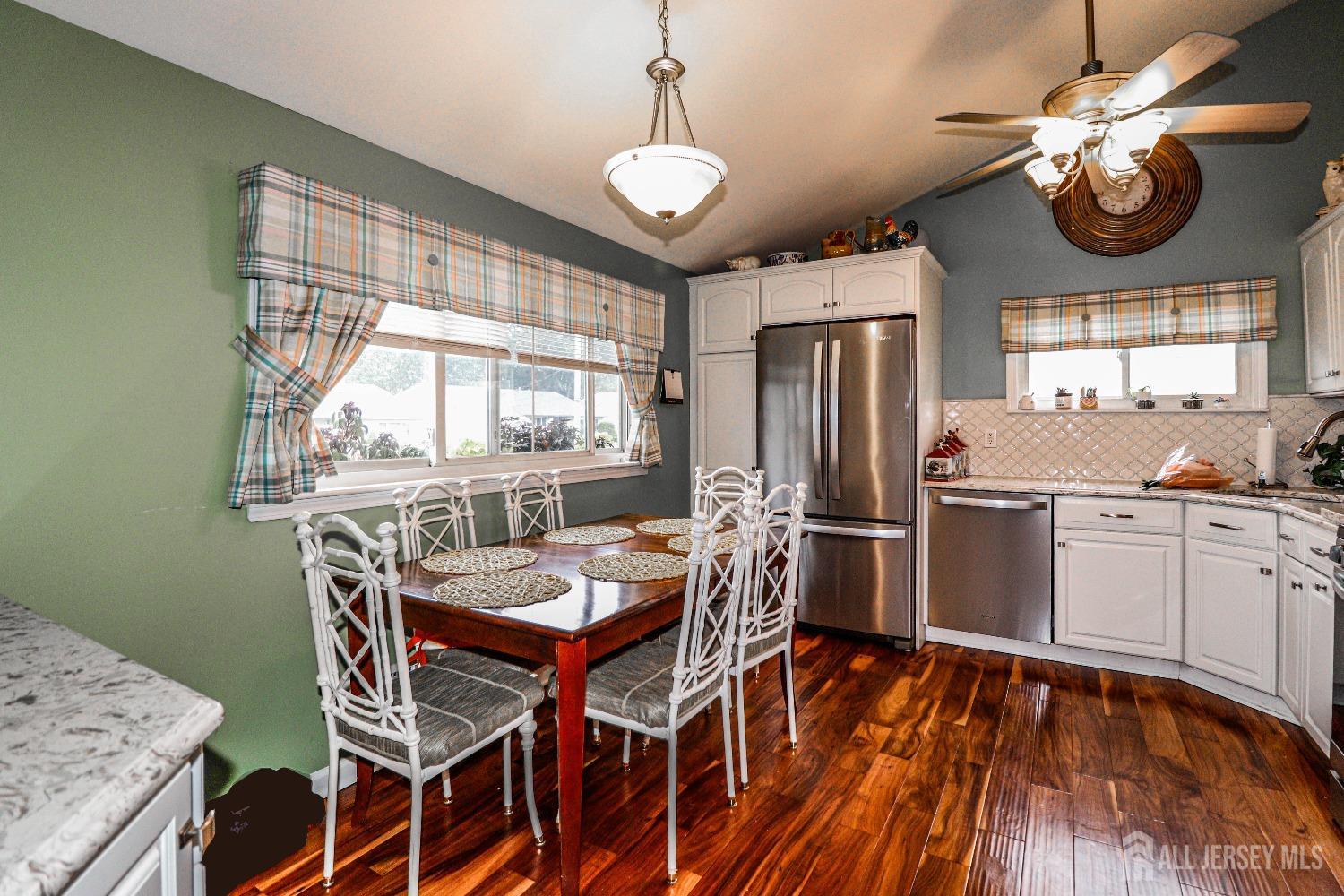 38 Westminster Road Colonia, NJ 07067 - Photo 7 of 24 a view of a dining room with furniture window and wooden floor