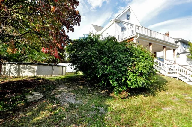 a view of balcony with a potted plant