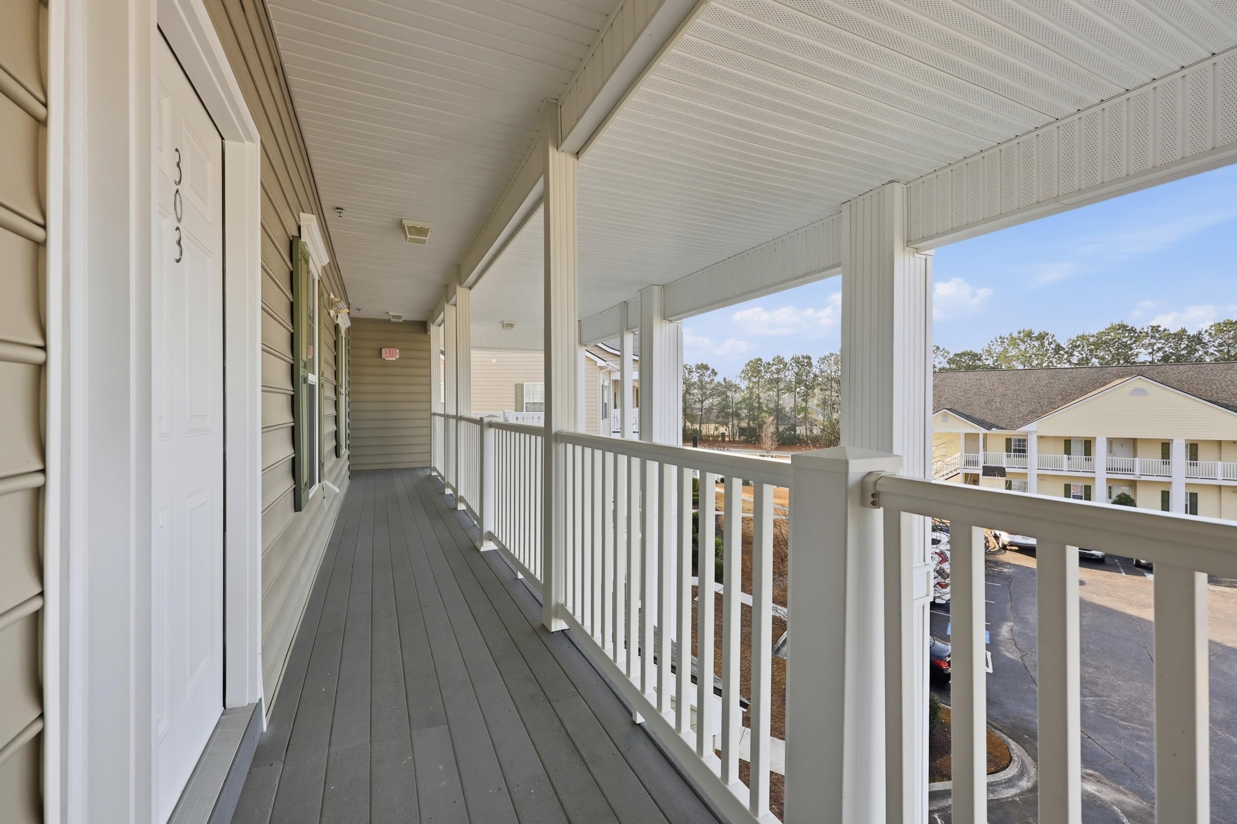 5810 Longwood Drive, Unit 303 Murrells Inlet, SC 29576 - Photo 18 of 27 View of wooden terrace