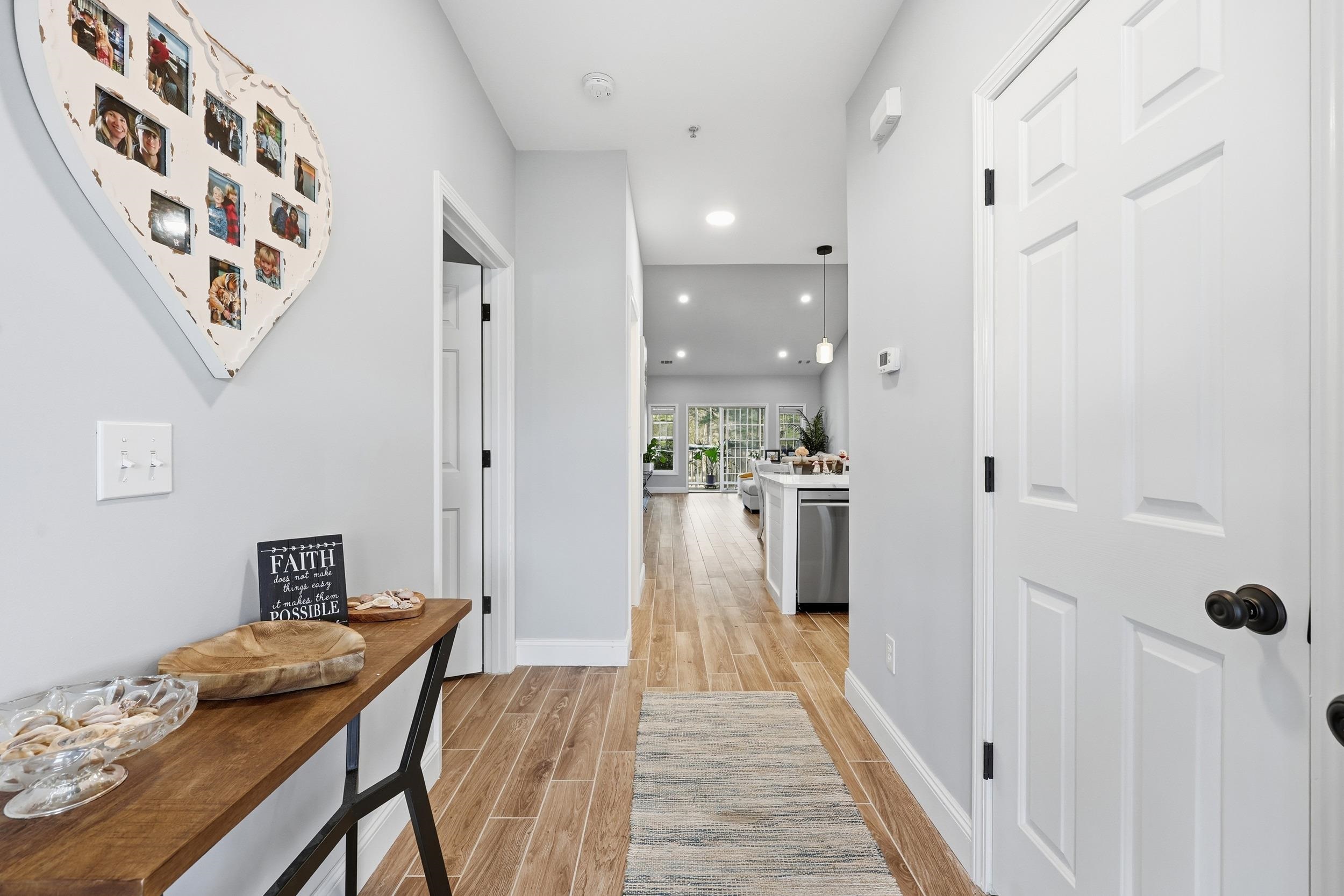 5810 Longwood Drive, Unit 303 Murrells Inlet, SC 29576 - Photo 2 of 27 Hall featuring wood finish floors and recessed lighting