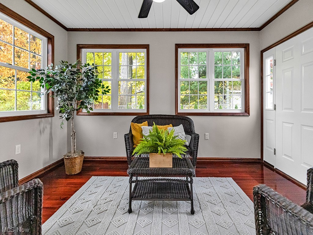 891 Susan Road Ravenna, OH 44266 - Photo 9 of 28 Living area with plenty of natural light, dark hardwood / wood-style flooring, and ceiling fan
