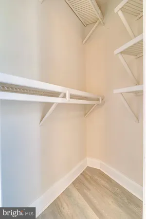 a view of small space with racks on the wall
