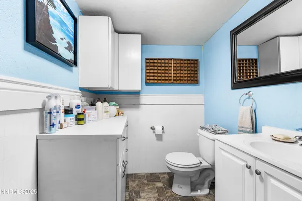 a bathroom with a sink and a toilet