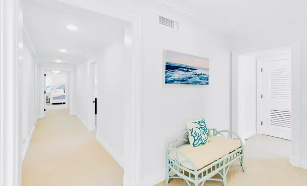 a bed room with a bed and a flat tv screen