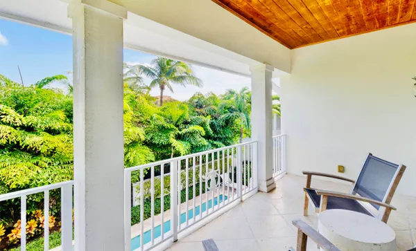 a view of swimming pool with a garden