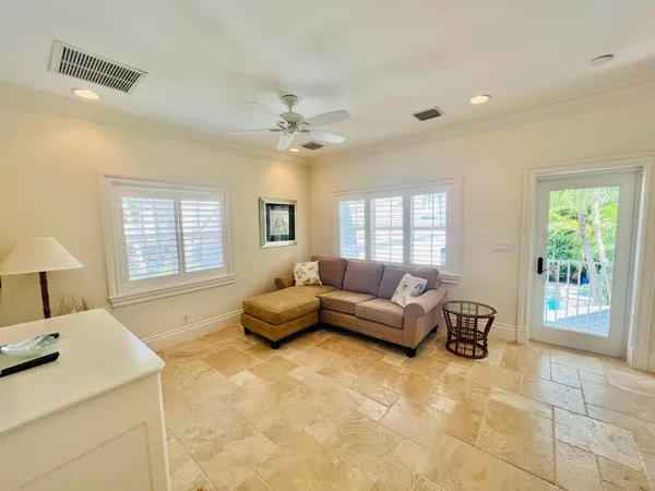 a bedroom with a bed and a lamp