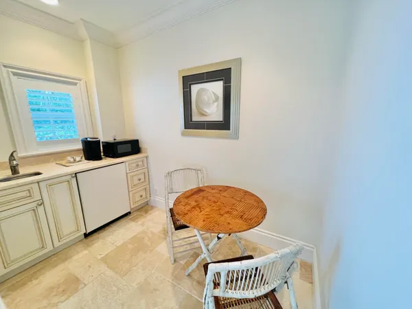 a swimming pool with outdoor seating and yard