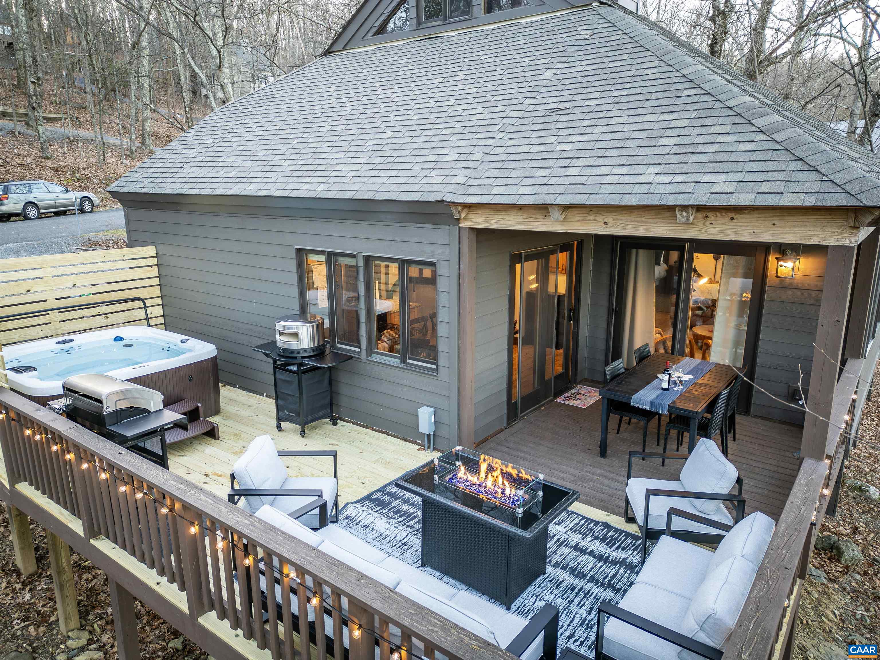 96 Squirrel Tree Lane Roseland, VA 22967 - Photo 43 of 46 a outdoor space with patio the couches and a dining table with the balcony