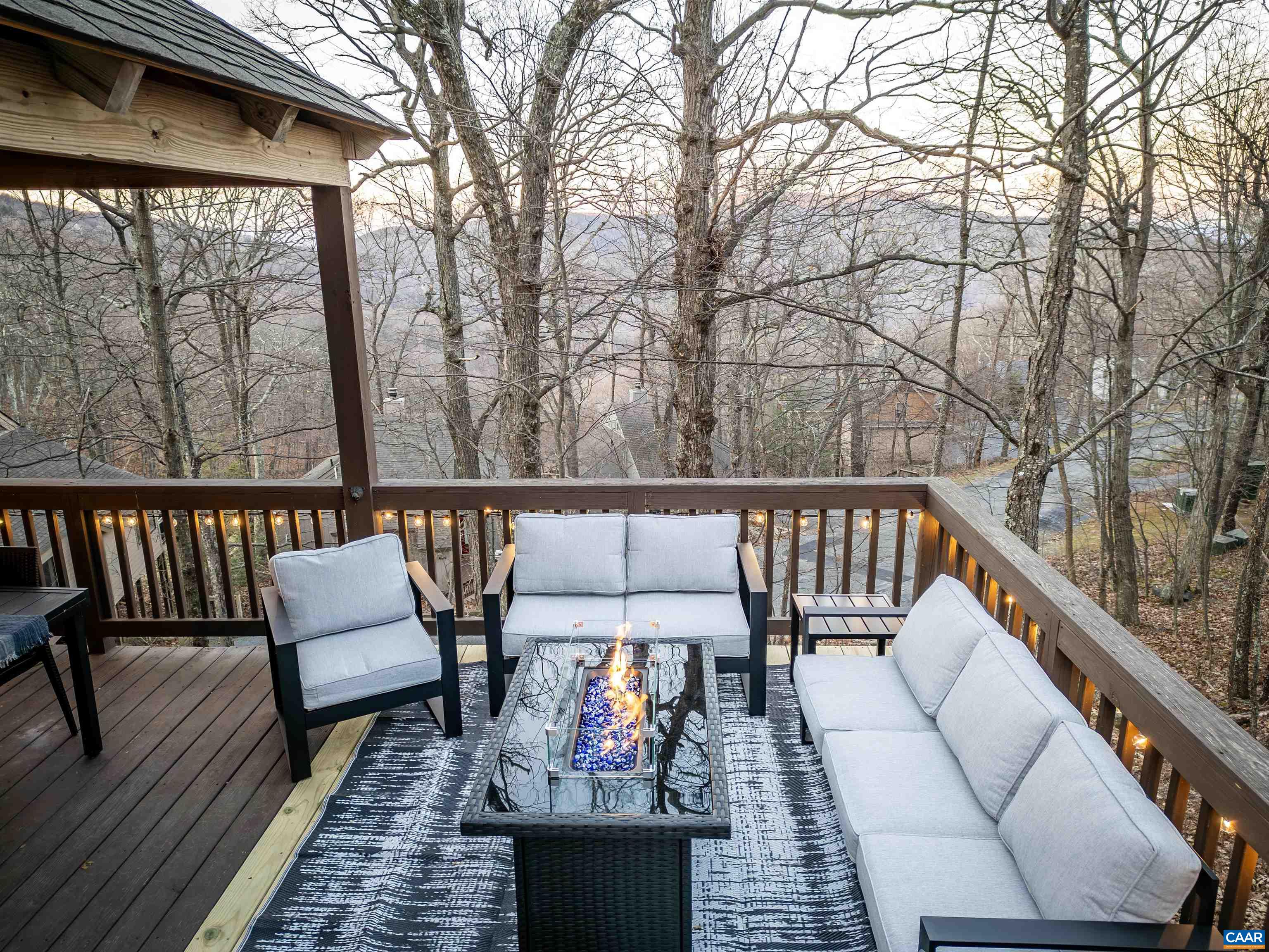 96 Squirrel Tree Lane Roseland, VA 22967 - Photo 46 of 46 a balcony with wooden floor outdoor seating and outdoor seating