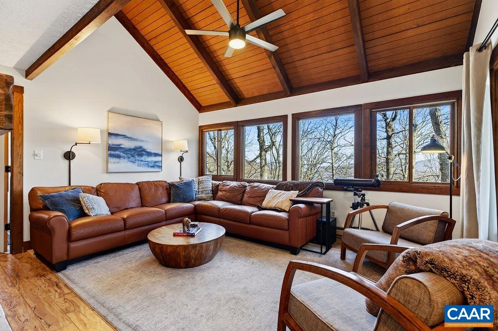 96 Squirrel Tree Lane Roseland, VA 22967 - Photo 6 of 46 a living room with furniture and a large window