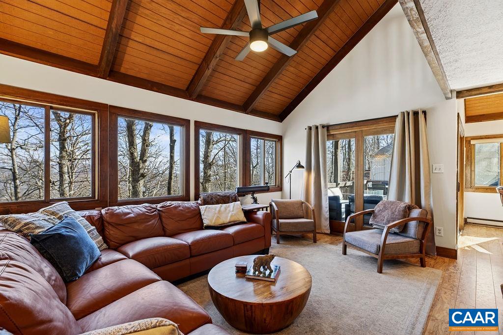 96 Squirrel Tree Lane Roseland, VA 22967 - Photo 7 of 46 a living room with furniture and a large window