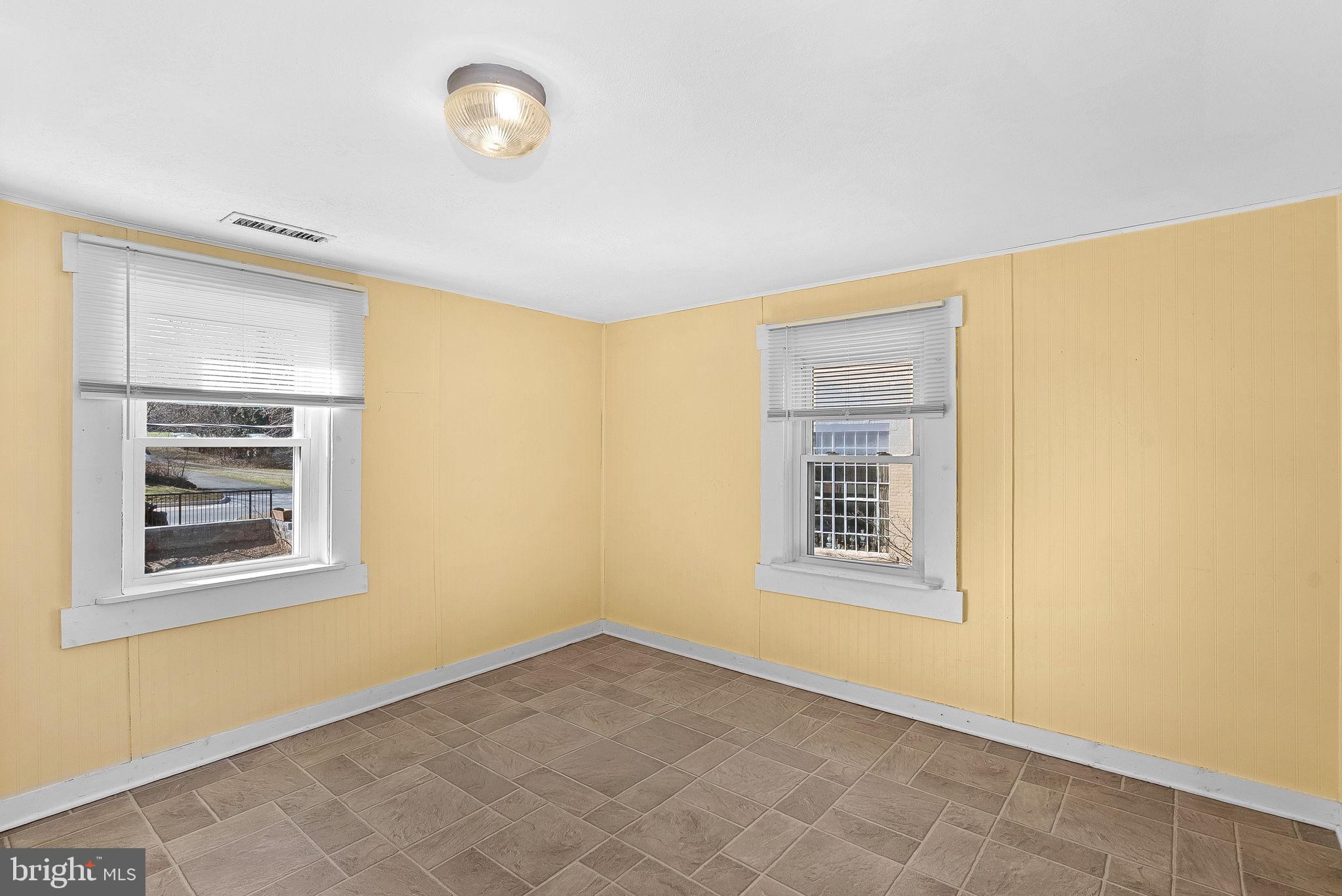31 Main Street Round Hill, VA 20141 - Photo 20 of 35 a view of an empty room with a window and dresser