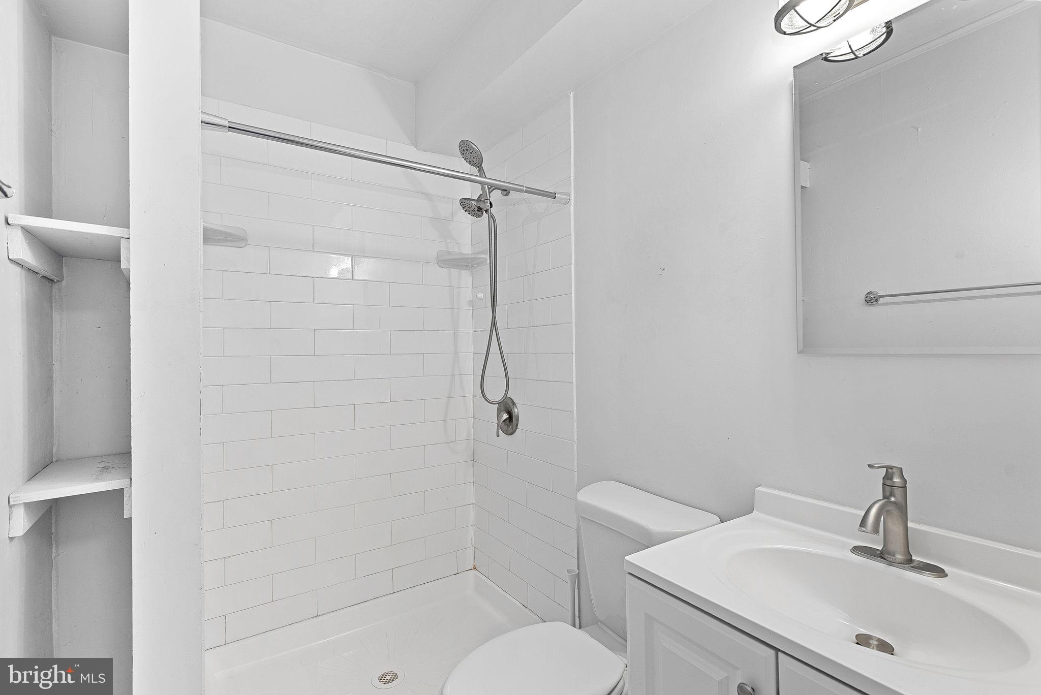 31 Main Street Round Hill, VA 20141 - Photo 28 of 35 a bathroom with a toilet sink and shower