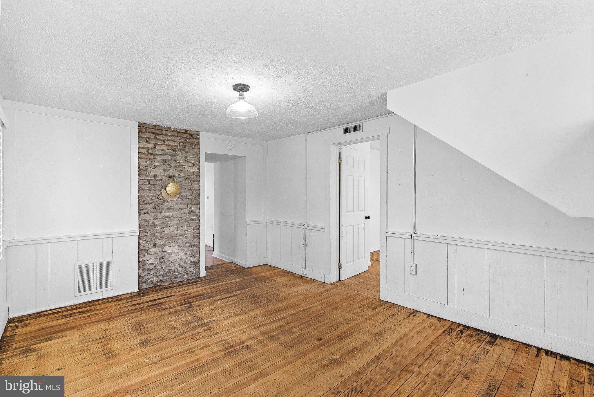 31 Main Street Round Hill, VA 20141 - Photo 5 of 35 a view of empty room with wooden floor