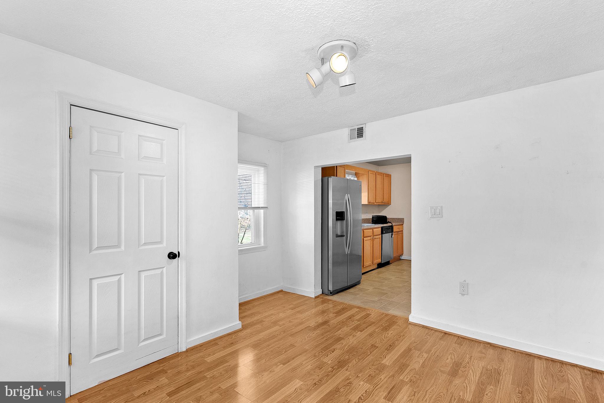 31 Main Street Round Hill, VA 20141 - Photo 8 of 35 a view of a livingroom with wooden floor and closet