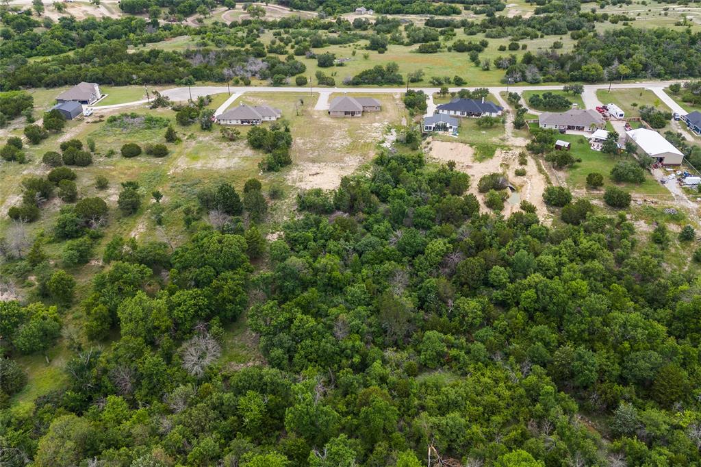 139 Kriston Lane Springtown, TX 76082 - Photo 38 of 39 Expansive undeveloped land featuring mature trees and varied topography