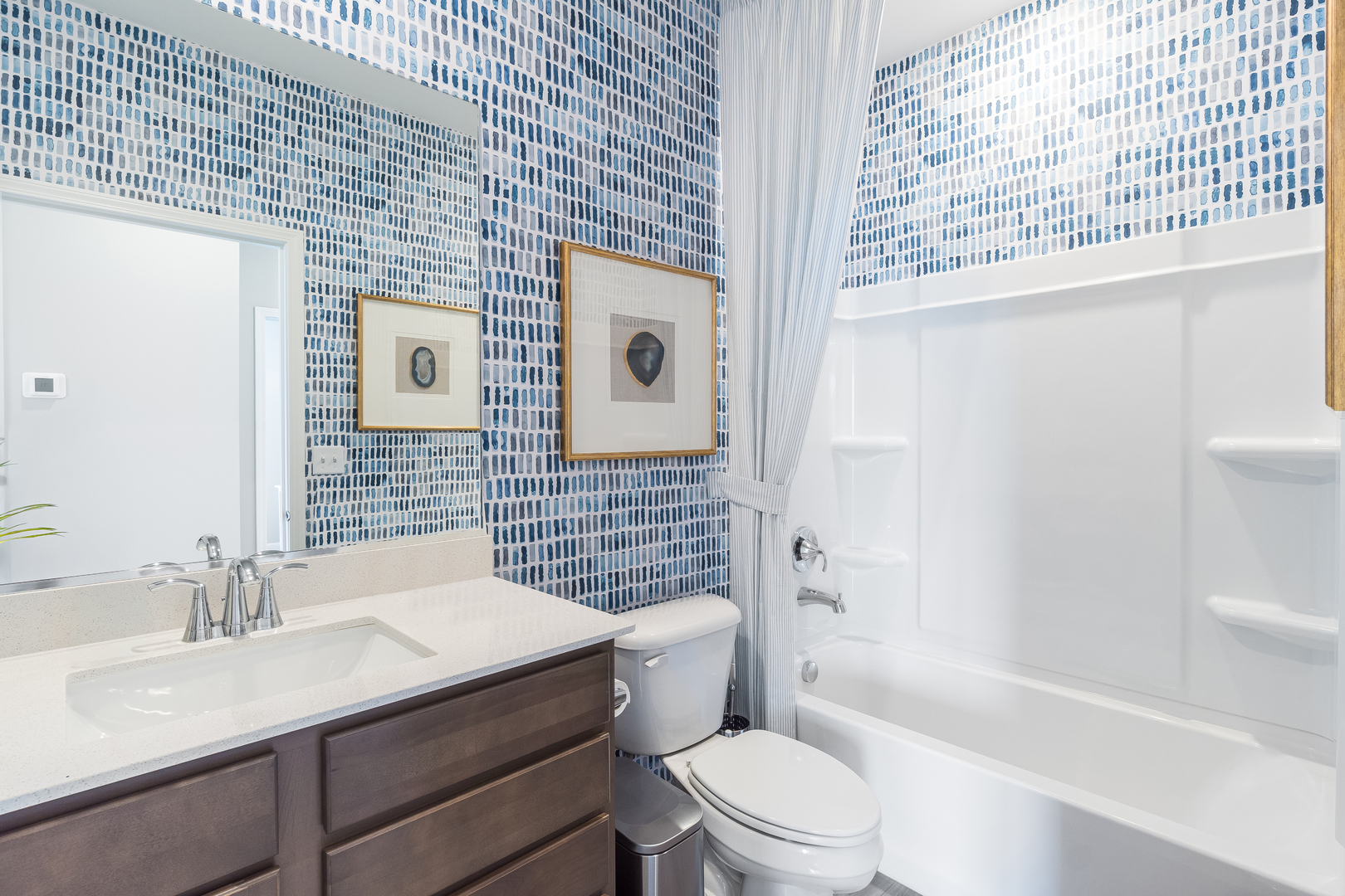 4245 Meadowridge Road Woodstock, IL 60098 - Photo 19 of 21 a bathroom with a sink a toilet and shower