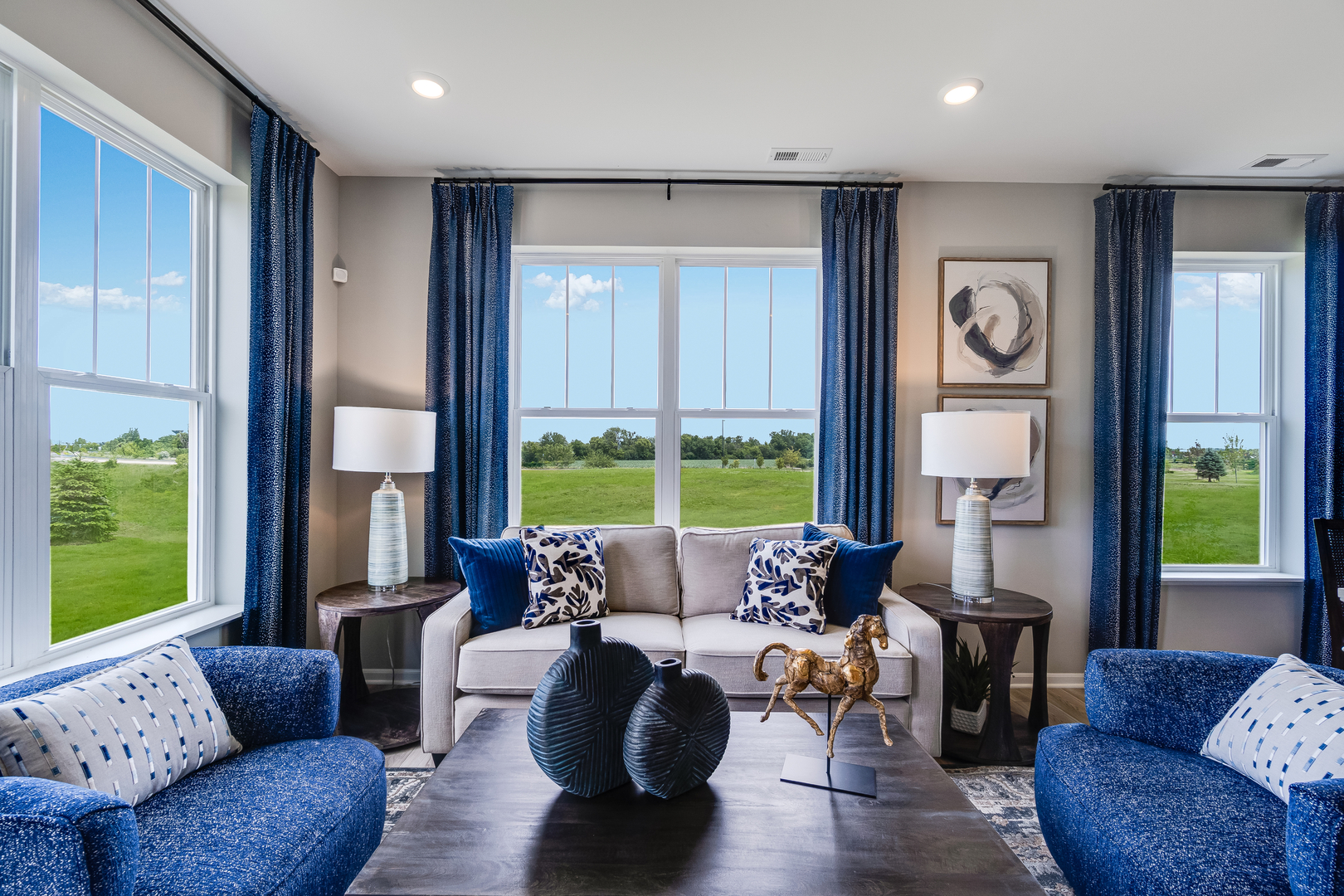 4245 Meadowridge Road Woodstock, IL 60098 - Photo 2 of 21 a living room with furniture and a large window