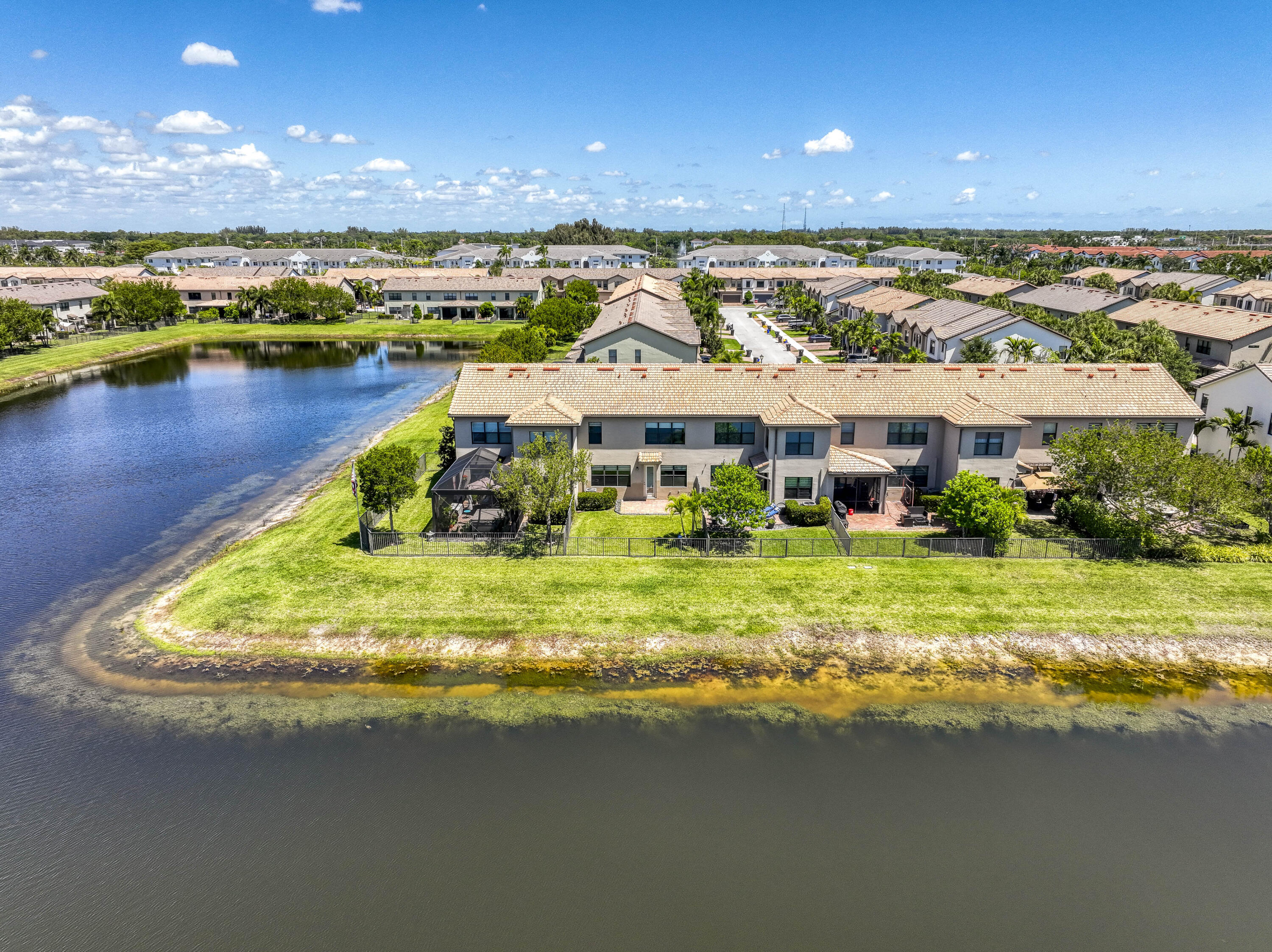 8301 Rearing Lane Lake Worth, FL 33467 - Photo 31 of 33 a view of a lake with a house