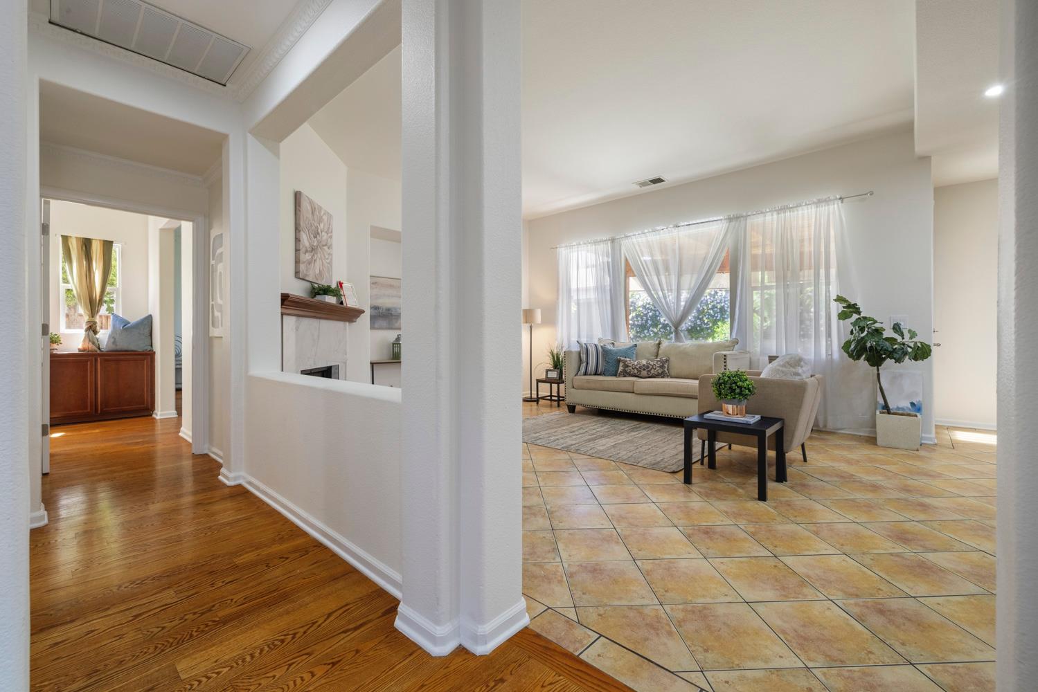 481 Keys Court Tracy, CA 95377 - Photo 14 of 45 a view of a livingroom with furniture and a hallway