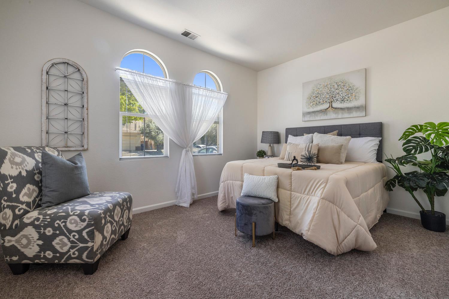 481 Keys Court Tracy, CA 95377 - Photo 15 of 45 a bedroom with bed and a window