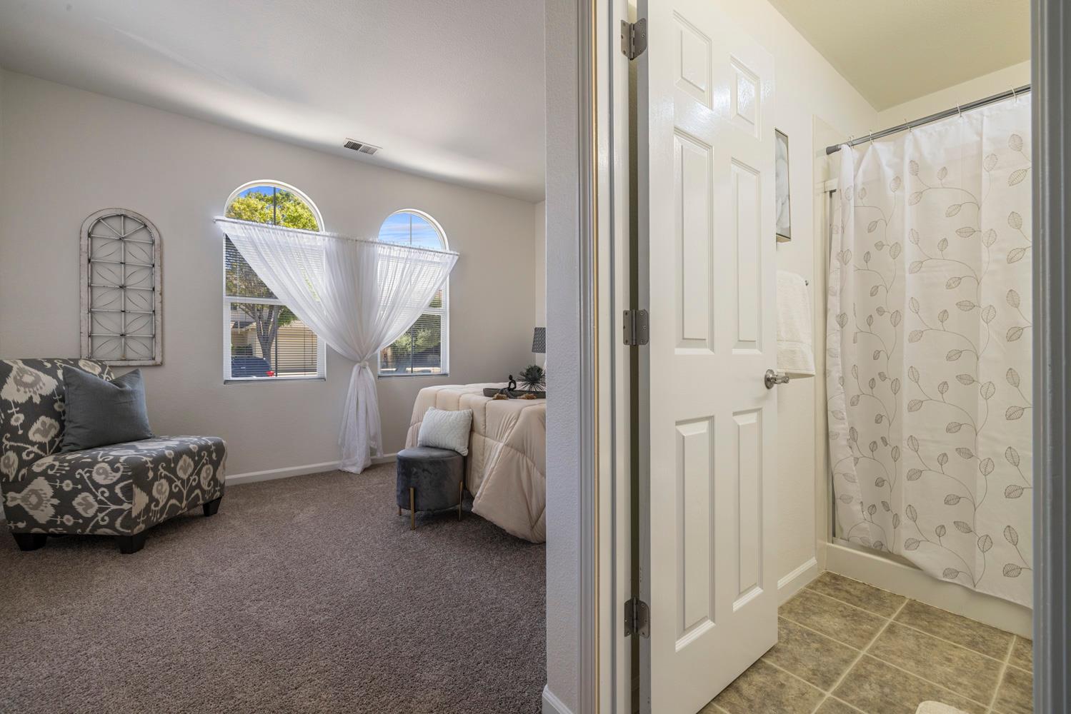 481 Keys Court Tracy, CA 95377 - Photo 16 of 45 a view of bedroom with a bed and a window