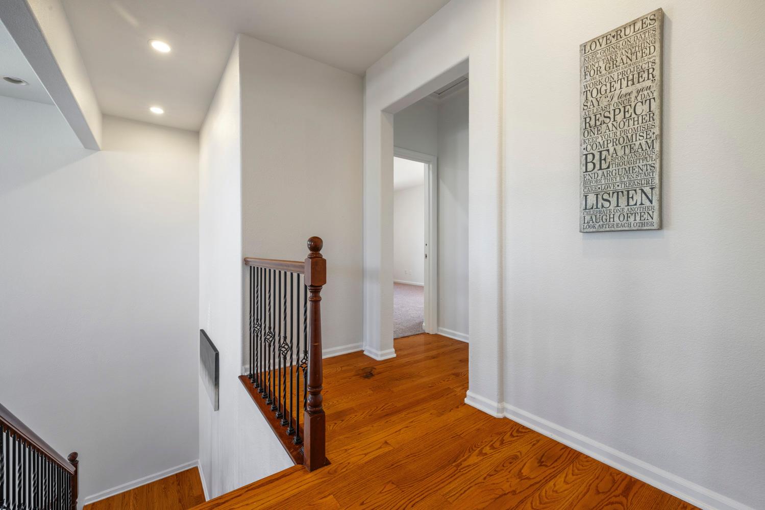 481 Keys Court Tracy, CA 95377 - Photo 28 of 45 a view of a hallway with wooden floor