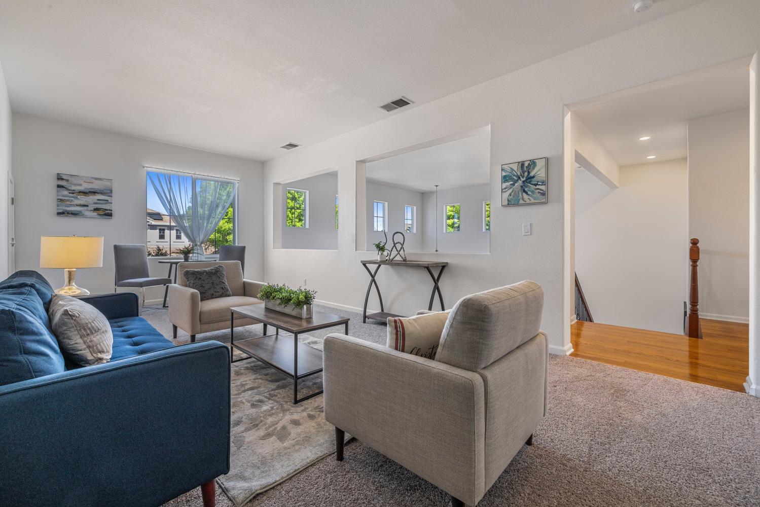 481 Keys Court Tracy, CA 95377 - Photo 29 of 45 a living room with furniture and a potted plant