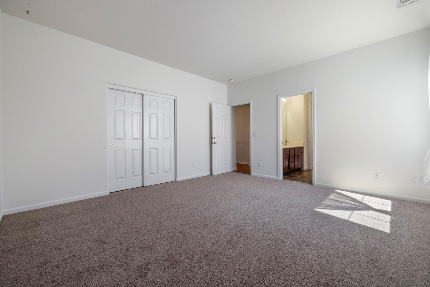 481 Keys Court Tracy, CA 95377 - Photo 32 of 45 a view of an empty room with closet and entryway