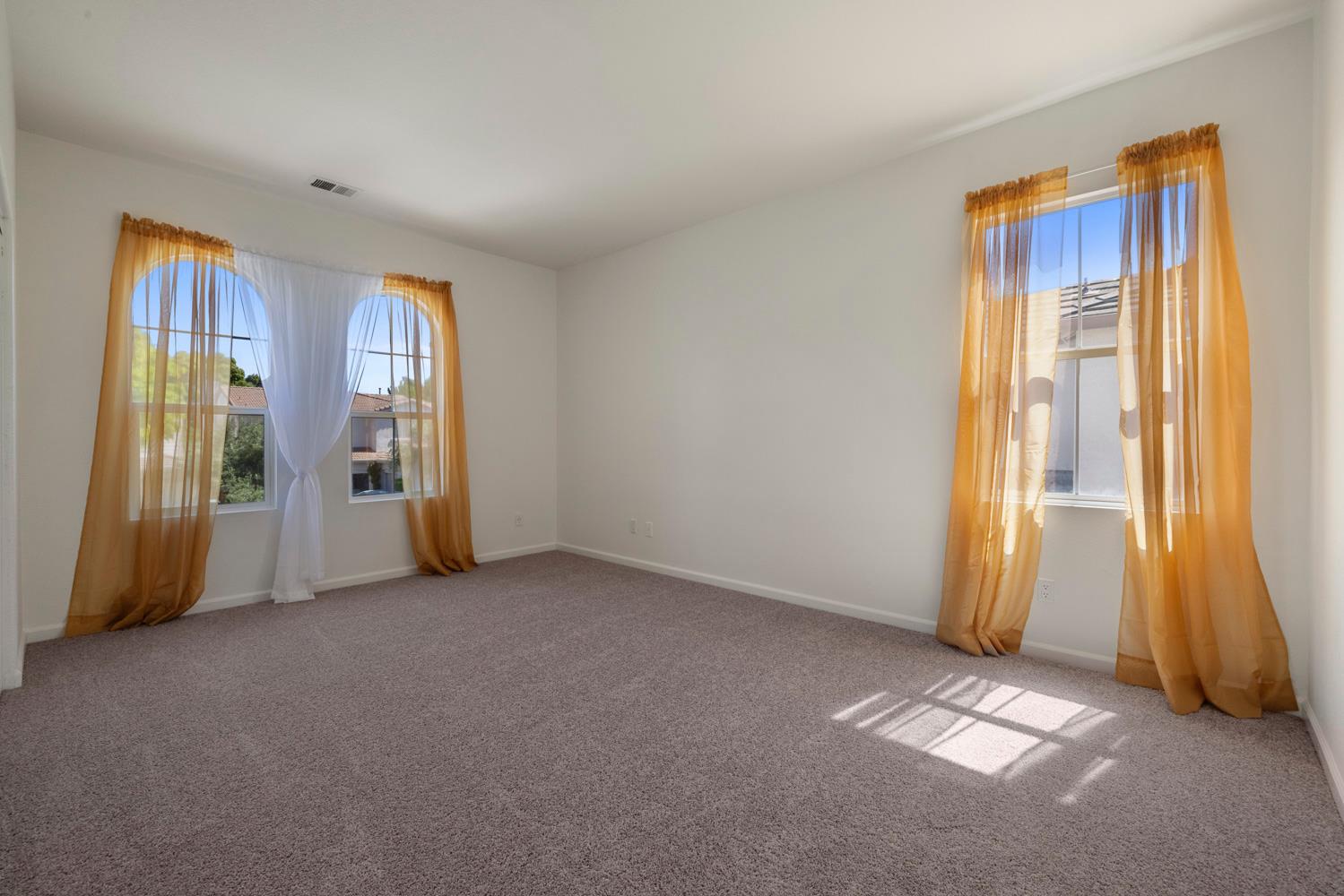 481 Keys Court Tracy, CA 95377 - Photo 34 of 45 a view of an empty room with a window