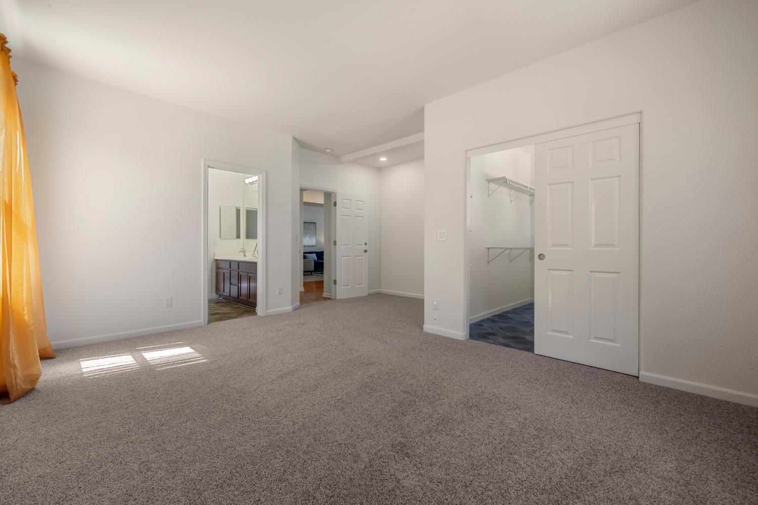 481 Keys Court Tracy, CA 95377 - Photo 35 of 45 an empty room with windows and closet