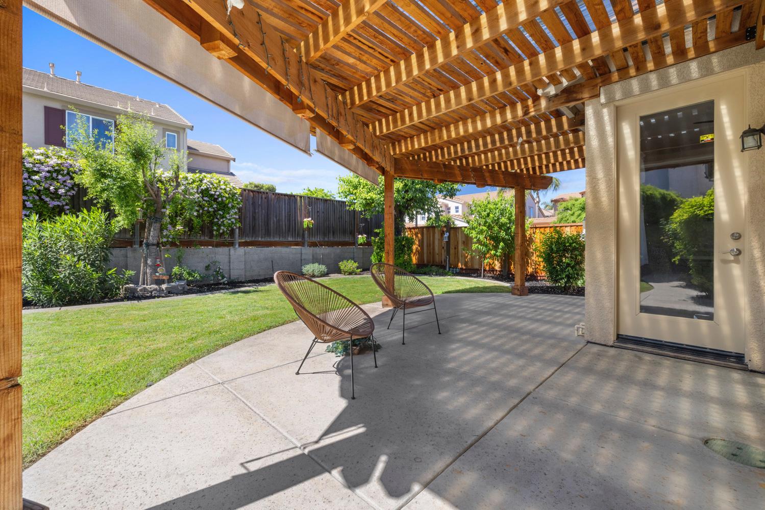 481 Keys Court Tracy, CA 95377 - Photo 39 of 45 a chair and table in the garden