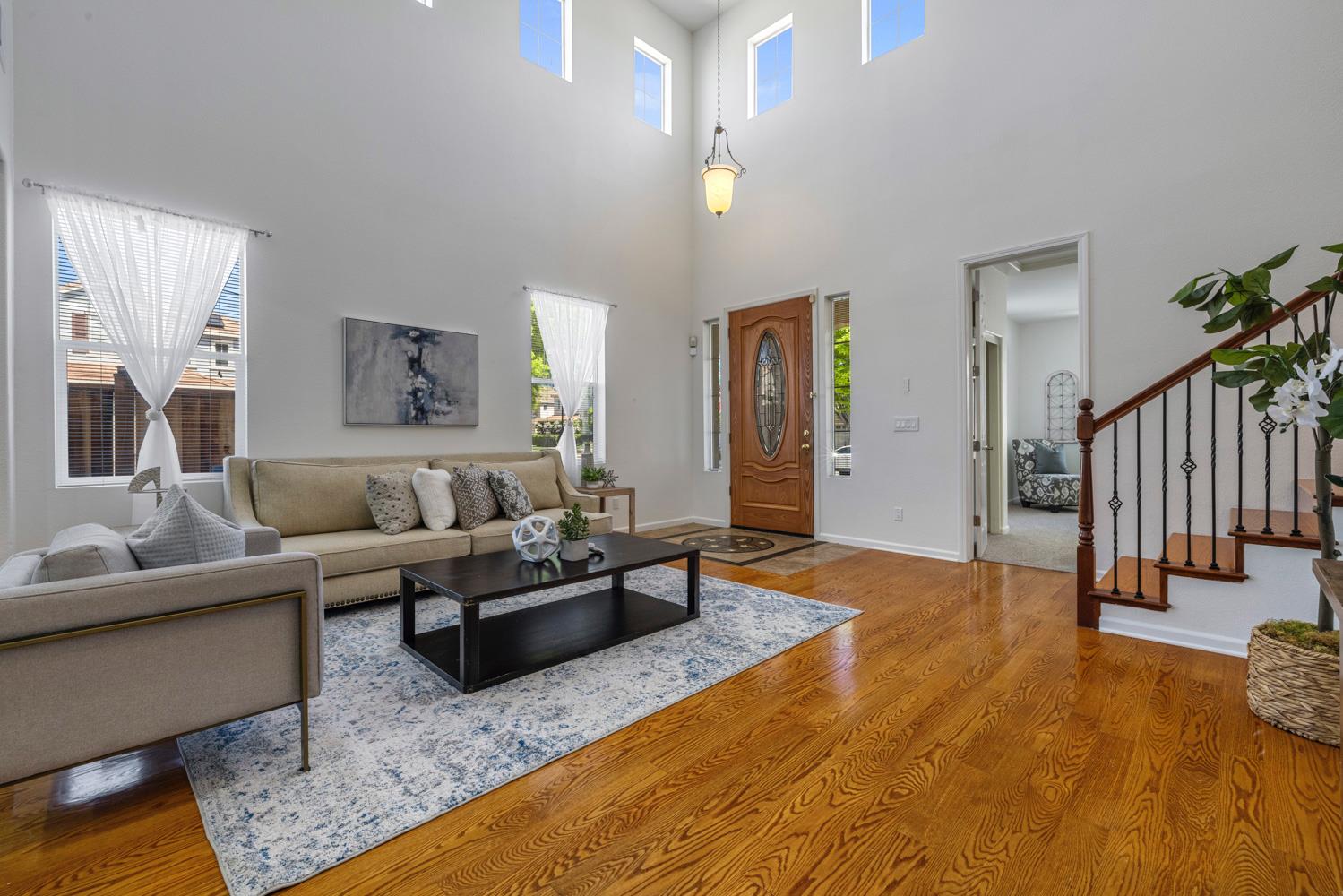 481 Keys Court Tracy, CA 95377 - Photo 4 of 45 a living room with furniture and a rug