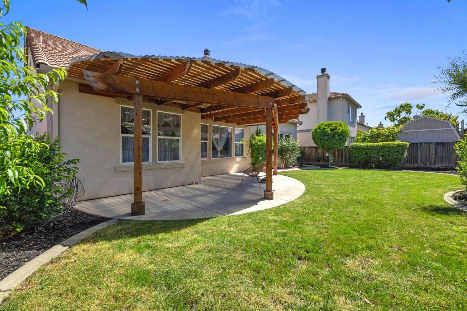 481 Keys Court Tracy, CA 95377 - Photo 41 of 45 a view of a house with backyard and porch