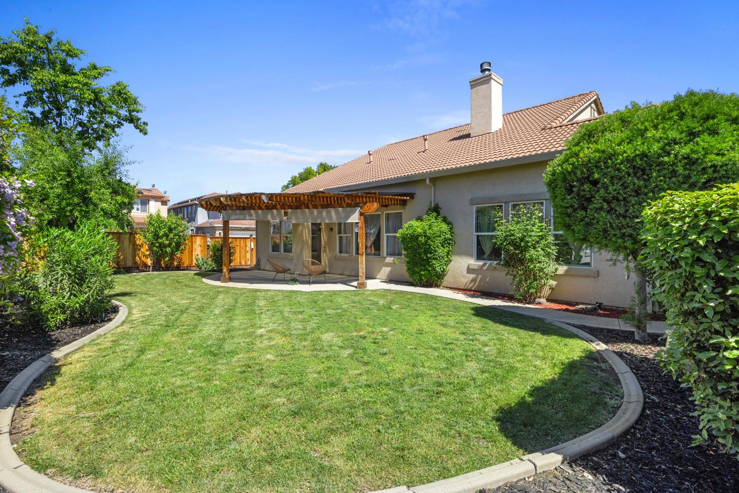 481 Keys Court Tracy, CA 95377 - Photo 42 of 45 a view of a house with backyard and garden