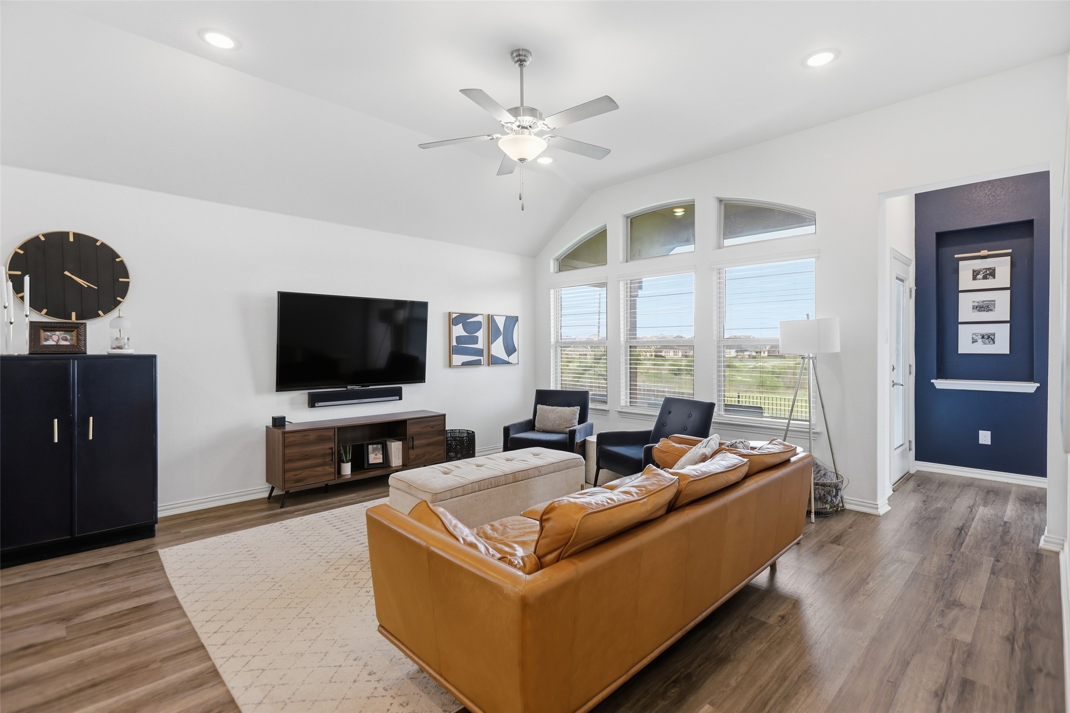 544 Cherrystone Loop Buda, TX 78610 - Photo 5 of 40 a living room with furniture and a flat screen tv