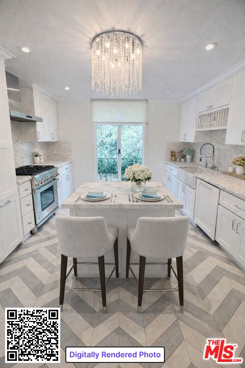 936 Chantilly Road Los Angeles, CA 90077 - Photo 6 of 25 a kitchen with stainless steel appliances granite countertop a stove a sink a table and chairs