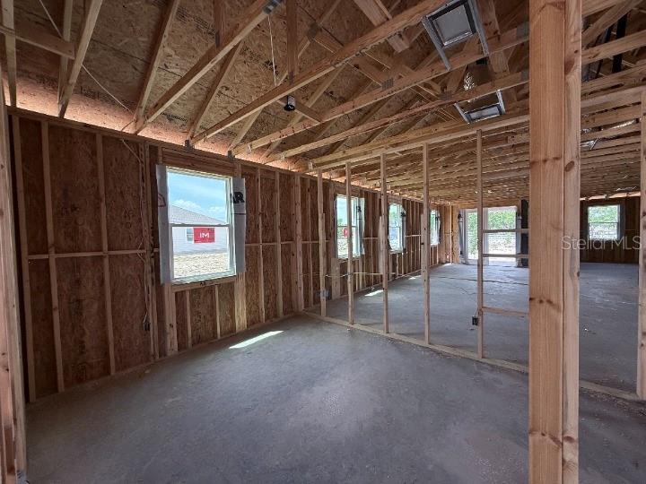 30116 Misty Pnes Road Mount Dora, FL 32757 - Photo 14 of 30 a view of empty room with wooden walls