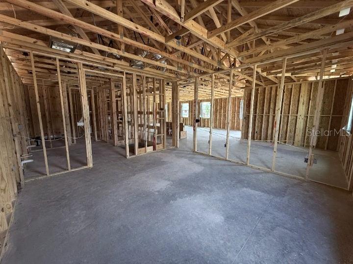 30116 Misty Pnes Road Mount Dora, FL 32757 - Photo 15 of 30 a view of an empty room with wooden walls
