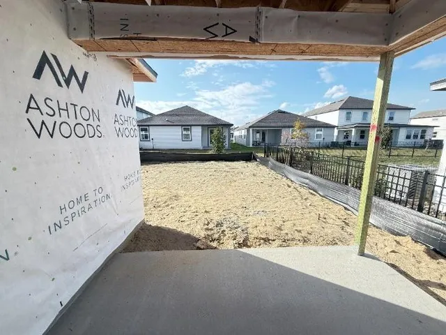 a view of a room with wooden walls