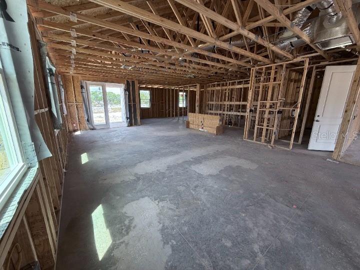 30116 Misty Pnes Road Mount Dora, FL 32757 - Photo 3 of 30 a view of an empty room with a garage
