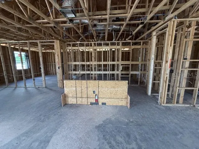 a view of back yard with wooden deck