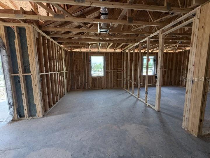 30116 Misty Pnes Road Mount Dora, FL 32757 - Photo 8 of 30 a view of empty room with wooden walls