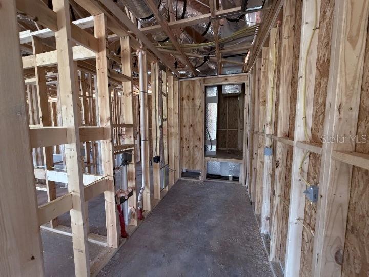 30116 Misty Pnes Road Mount Dora, FL 32757 - Photo 9 of 30 a view of an empty room with wooden floor