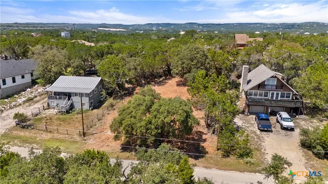 a view of a city from a yard